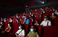 Beijing partly reopens movie theaters as coronavirus declines