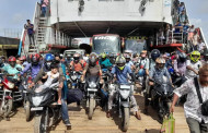 Homebound people crowd at Daulatdia, bikes face no barrier