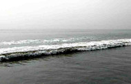 Depression over Northwest Bay weakens