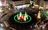 Greece's Omania Square fountain lit up in red and green