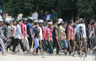 Chhatra League distributes cricket stumps among activists at TSC
