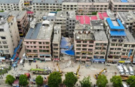 Eighteen trapped, others missing after China building collapse