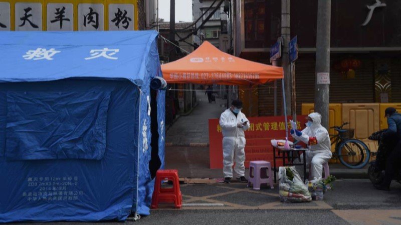 WHO team due in Wuhan as China reports first virus death in months