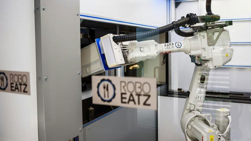 Kitchen robot in Riga cooks up new future for fast food