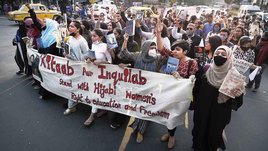 West Bengal Students protest with books in hijab row