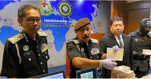 Malaysia busts Bangladeshi-led passport-forging syndicate